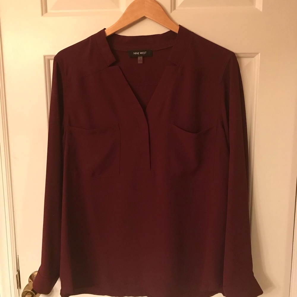 Wine colored long sleeved blouse